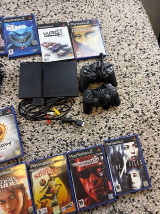 Playstation 2 slim with 2 controllers and 15 games