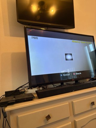 Playstation 2 slim with 2 controllers and 15 games