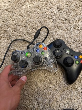 Xbox 360 with 16 games and 2 controllers
