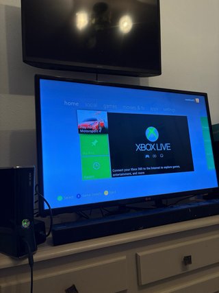 Xbox 360 with 16 games and 2 controllers