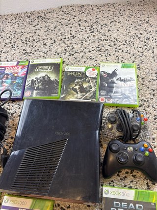 Xbox 360 with 16 games and 2 controllers