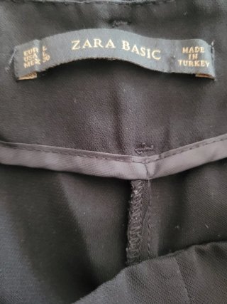 Pantalón negro ancho con cinturón