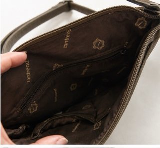 Borsa tracolla con frange e borchie