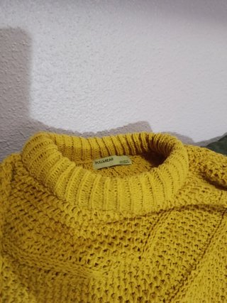 Jersey de punto amarillo, jersey rosa y uno blanco