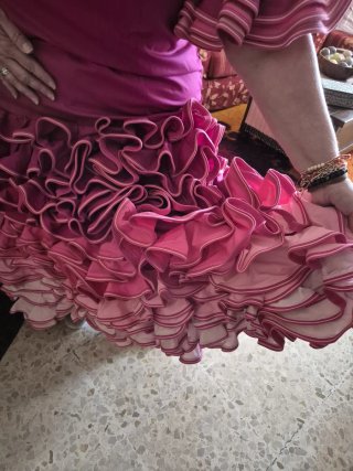 Traje de flamenca rosa y rojo