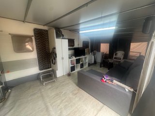 Caravana fija en camping