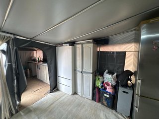 Caravana fija en camping