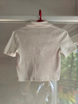 Top H&M blanco con texto