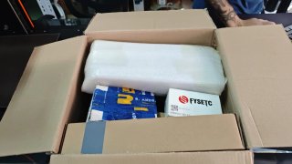 Caja con accesorios para montar una voron tiny m