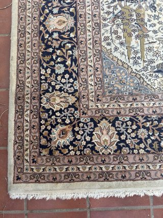 Alfombra antigua de lana multicolor