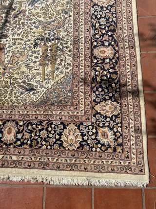 Alfombra antigua de lana multicolor