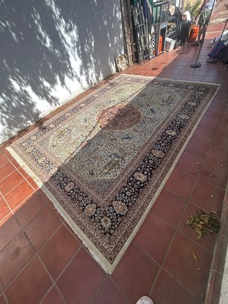 Alfombra antigua de lana multicolor