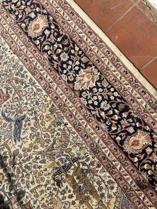 Alfombra antigua de lana multicolor