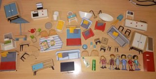 Casita de muñecas con personajes y mobiliario