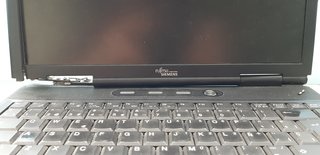 Fujitsu PIEZAS y Cargador Universal y conectores