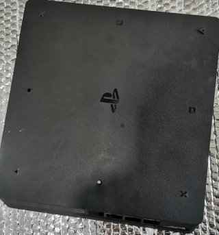 PS4 Slim Negra + 2 Juegos + 2 Mandos