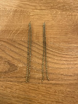 Pendientes largos plateados con brillantes