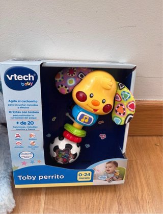 Sonajero Vtech y un peluche