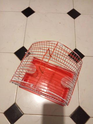 Jaula para mascotas roja y blanca