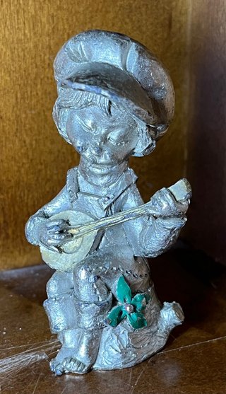 Statuetta scugnizzo vintage con banjo