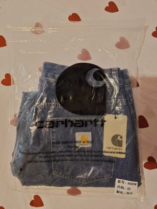 Pack pantalones Carhartt azul y Negro.