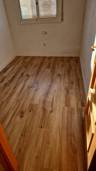 Suelo laminado tipo parquet