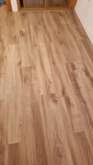 Suelo laminado tipo parquet