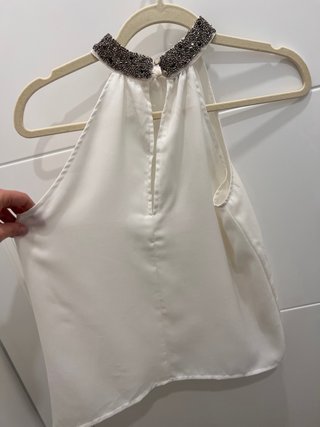 Top blanco con pedrería