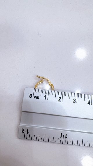 Orecchini cerchio fantasia in oro giallo 18kt 750