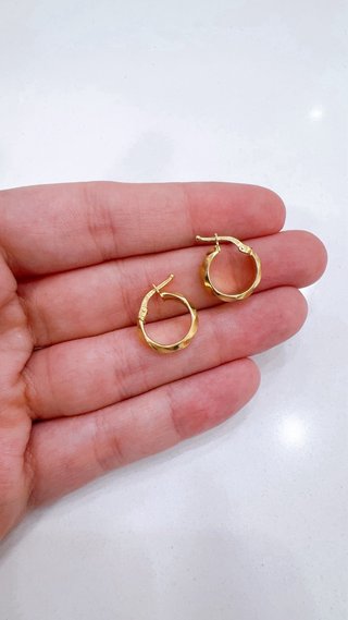 Orecchini cerchio fantasia in oro giallo 18kt 750