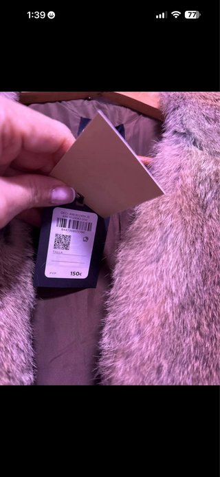 Poncho oversize con pelo