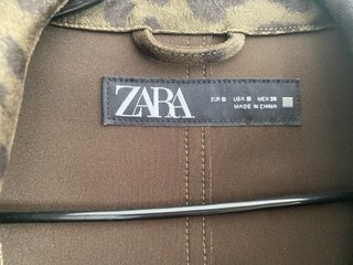 Gabardina Zara Animal Print,de entretentret nueva