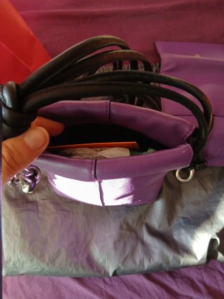 Bolso y monedero Tous piel morado
