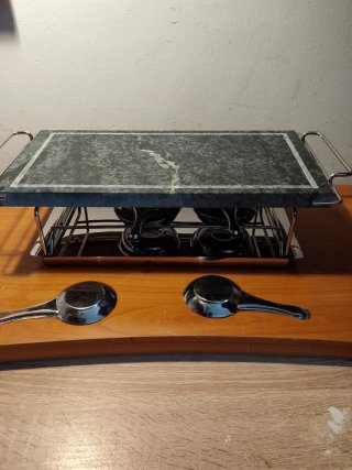 Parrilla de piedra y metal