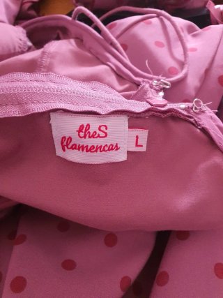 Traje de flamenca rosa con lunares