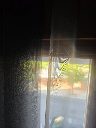 Cortinas grises y transparentes