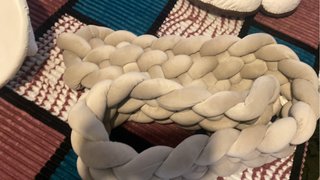 Trenza antivuelco para cuna