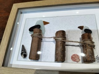 Quadretti artigianali con conchiglie e sassi