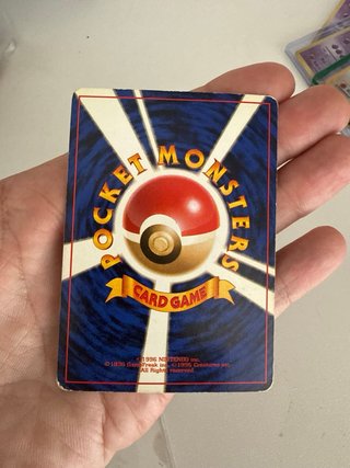 Carta Pokémon Charizard Maligno Rocket