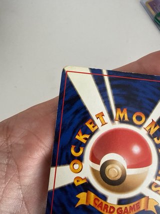Carta Pokémon Charizard Maligno Rocket