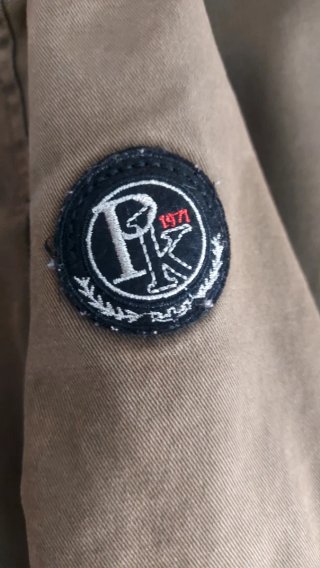Parka verde con capucha y forro de borreguito