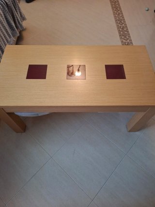 Mesa de centro madera y cristal elevable.
