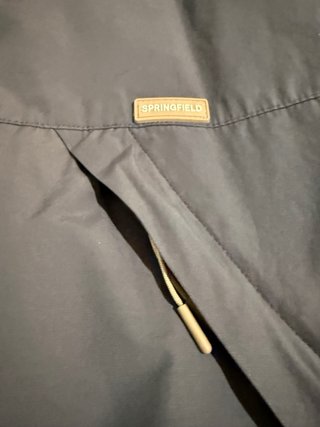 Chaqueta gris/azul acolchada con capucha