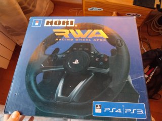 Consola PS5 con Volante pedales y cascos