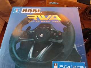 Consola PS5 con Volante pedales y cascos