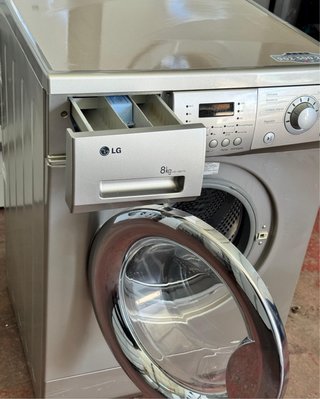 LAVADORA DE CARGA FRONTAL MARCA LG EN INOX
