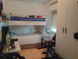 Dormitorio con literas - 3 camas