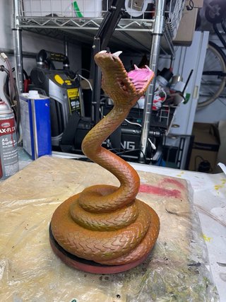 Soporte para auriculares serpiente morada