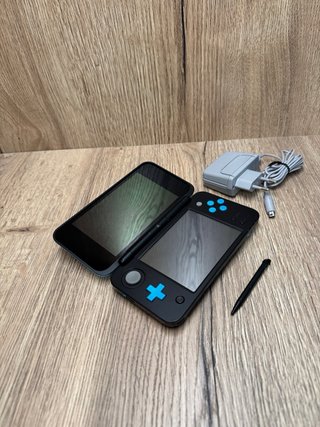 New nintendo 2DS XL negra y azul