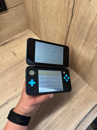 New nintendo 2DS XL negra y azul